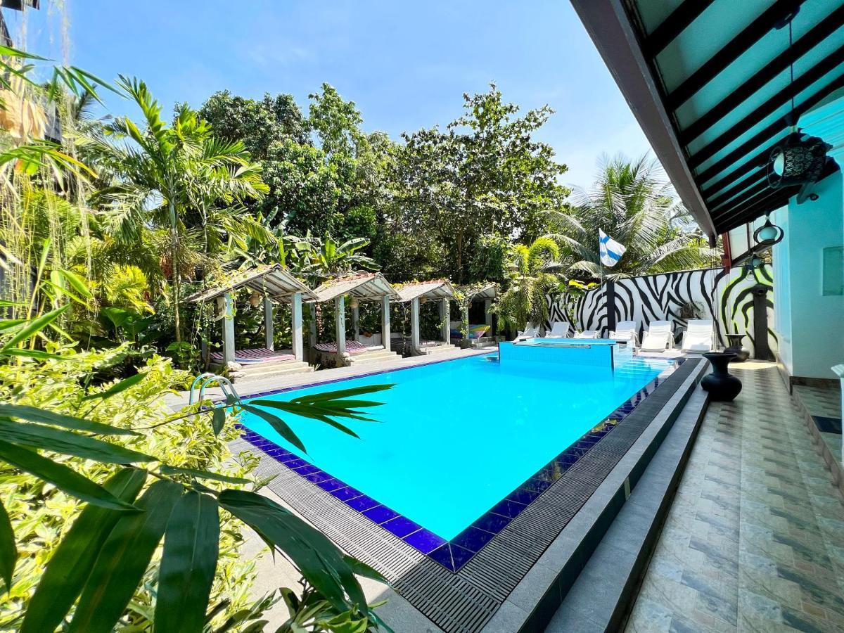 Secret Garden Otel Hikkaduwa Dış mekan fotoğraf